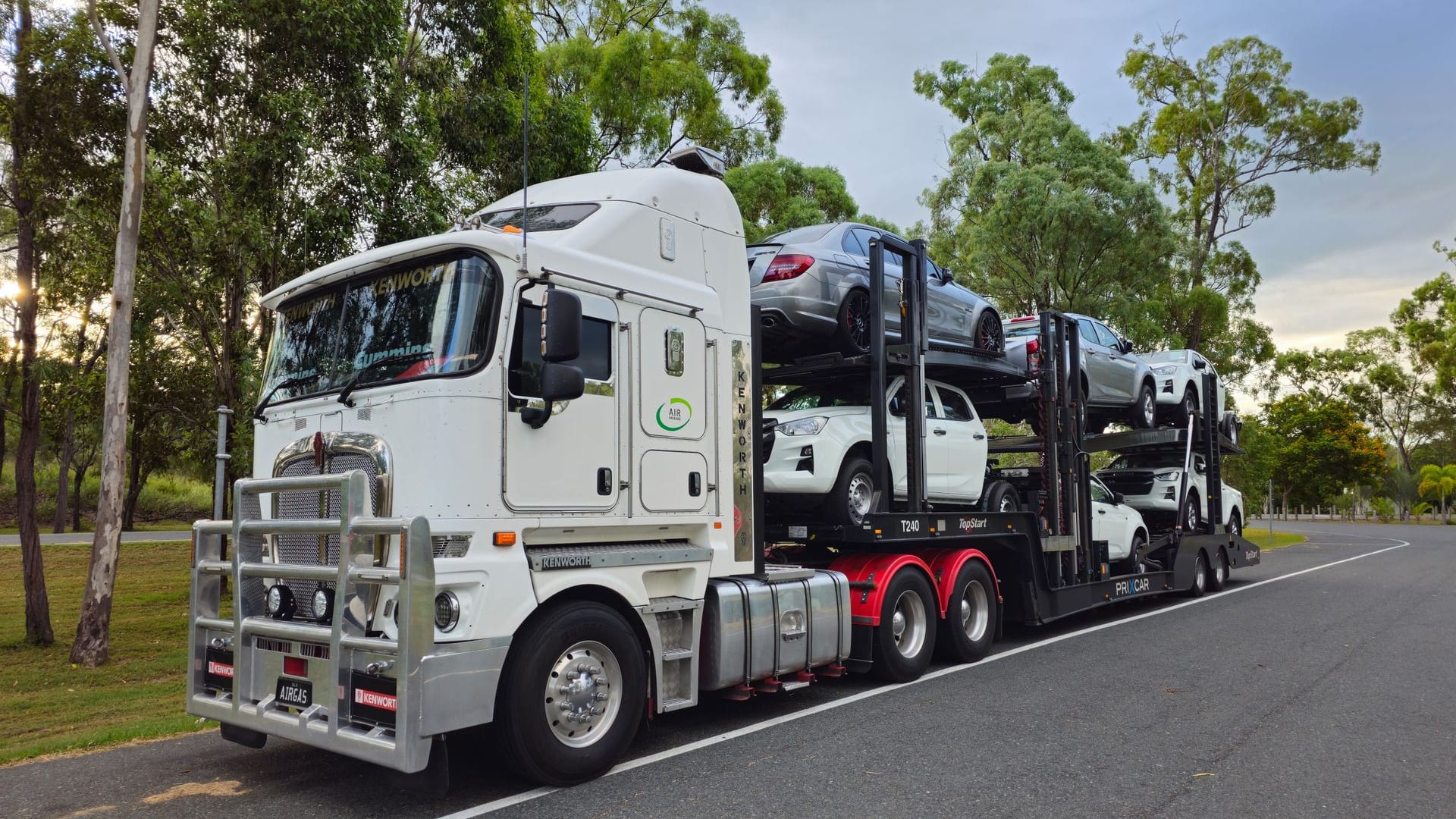 A cab-over car carrier loaded with new vehicles on an Australian road